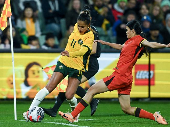 ADELAIDE, AUSTRALIA - MAY 31: Mary Fowler of Australia    competes with Chen Qiaozhu of China PR during the international friendly match between Australia Matildas and China PR at Adelaide Oval on May 31, 2024 in Adelaide, Australia. (Photo by Mark Brake/Getty Images)