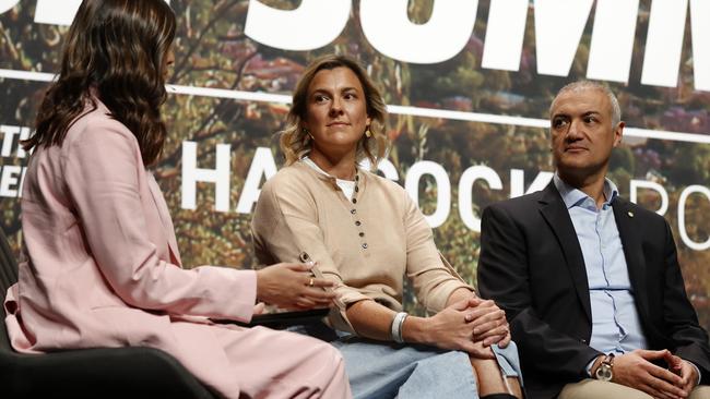 Panellists Penny Ashby, centre, and Ashraf Al-Ouf, right, chat at the Bush Summit. Picture: Jonathan Ng