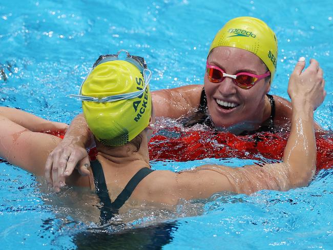 Gold medallist Kaylee McKeown (left) embraces bronze medallist Emily Seebohm after the 200m backstroke final. Picture; Getty Images