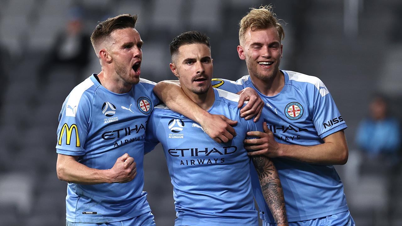 Jamie Maclaren (C) guided Melbourne City to A-League semi-final victory.