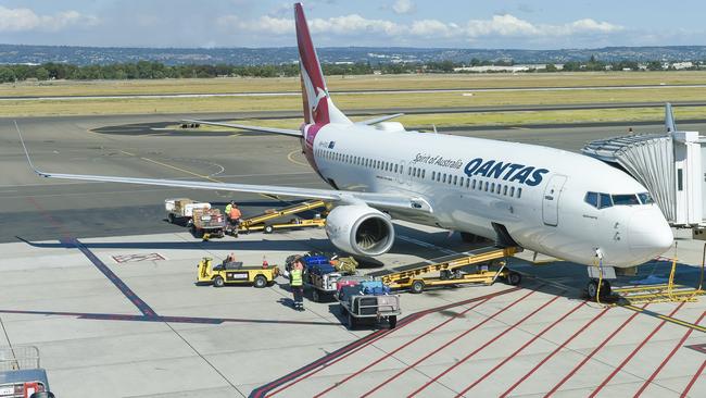 Qantas airport baggage handlers prior to the outsourcing of the airline’s ground handling services.