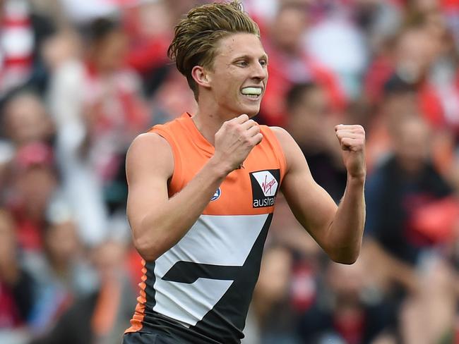 Lachie Whitfield of the Giants celebrates after kicking a goal during the first qualifying final AFL match between the Sydney Swans and the Greater Western Sydney Giants at ANZ Stadium in Sydney, Saturday, Sept. 10, 2016. (AAP Image/Dean Lewins) NO ARCHIVING, EDITORIAL USE ONLY