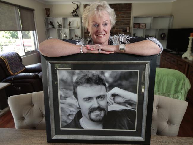 Helen Gerard with a picture of son Chris “Bushy” Bushnell when he was 36. Picture: Tait Schmaal.