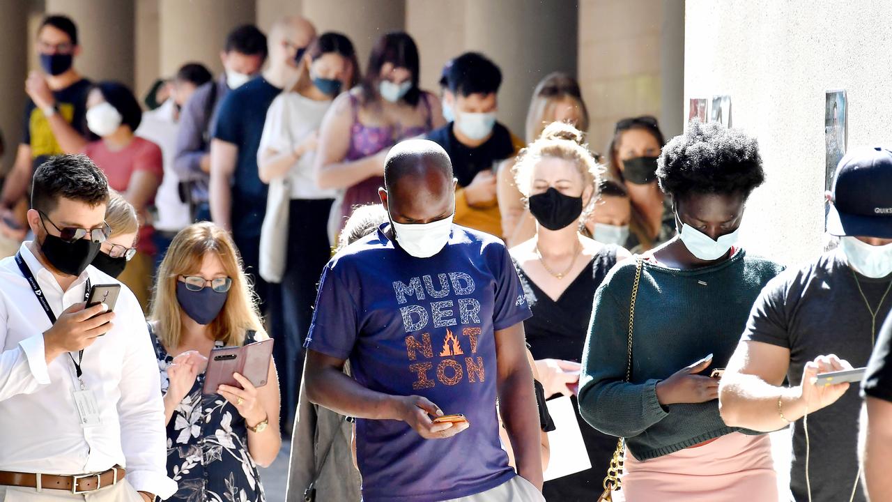 Lines of people at the Brisbane vaccination hub at Brisbane Convention and Exhibition Centre in September. Picture: NCA NewsWire / John Gass