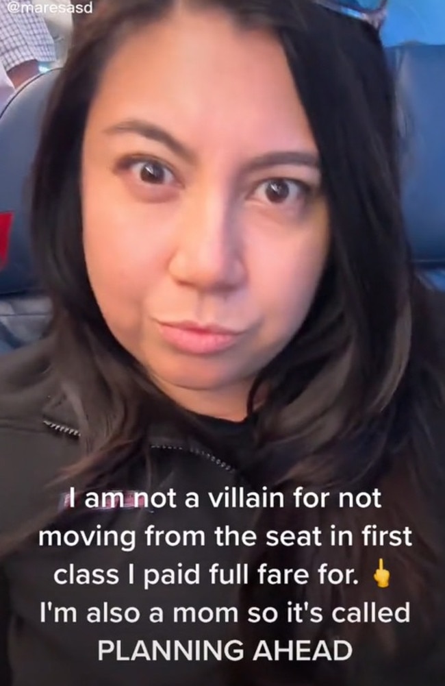 A US woman sparked a heated debate after she revealed she refused to give up her first class seat to accommodate a family-of-three. Picture: TikTok/maresasd