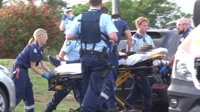 Liam Anderson is treated by paramedics as he is taken to a waiting rescue chopper. Picture: TNV