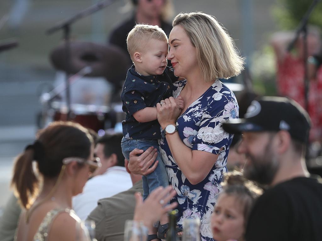 Kelly Viney dances with her son Vincent whilst enjoying the NYE party at the 2019 Taste of Tasmania. Picture: LUKE BOWDEN