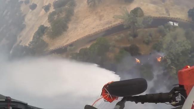 Firefighting Helicopter Uses Water Drop to Control Mendocino Complex