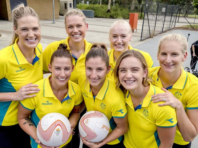 Newly selected player of the Diamonds Commonwealth Games Team (back L-R) Caitlin Bassett, Caitlin Thwaites, Jo Weston, April Brandley, (front L-R) Madi Robinson, Kim Ravaillion and Liz Watson pose for a photograph in Melbourne, Monday, February 5, 2018. (AAP Image/Luis Enrique Ascui) NO ARCHIVING, EDITORIAL USE ONLY