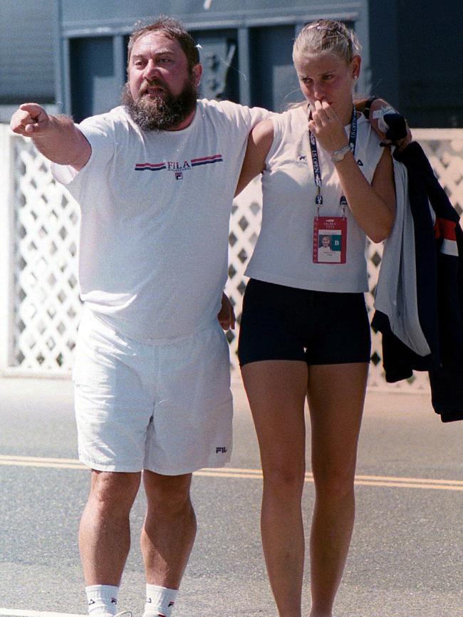 Upset player Jelena Dokic with her father Damir after he got into a dispute with officials during the US Open at Flushing Meadows in New York. Picture: Charles Fowler.