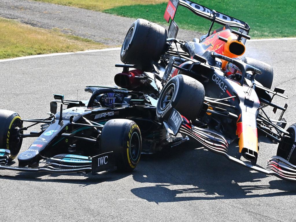 Max Verstappen’s Red Bull ended up on top of Lewis Hamilton’s head. (Photo by Peter Van Egmond/Getty Images)