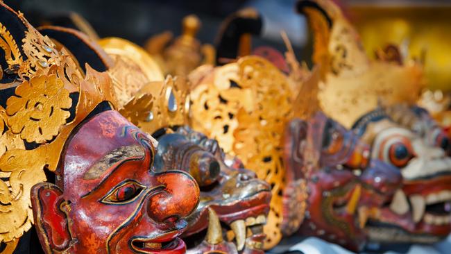 Traditional masks are a feature of Tumpek Krulut.