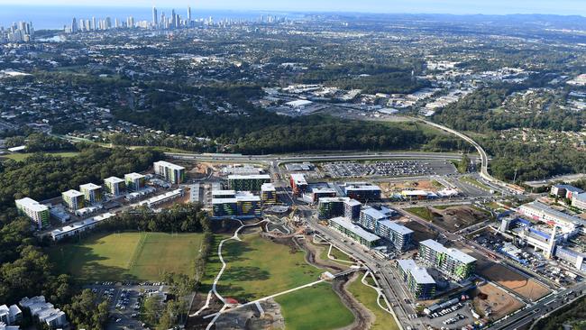 The Athletes Village at Parklands — once they leave and residents move in there will be pressure on local schools. (AAP Image/Dave Hunt)