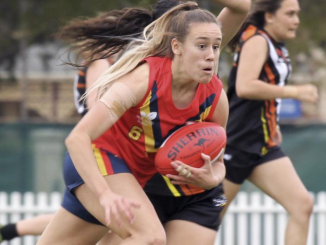 Round One of the 2019 NAB AFLW Under-18 Championships began today, Friday, May 31   at Peter Motley Oval, Unley, South Australia between South Australia and Northern Territory. SA's Hannah Munyard wins the ball again. Picture Dean Martin