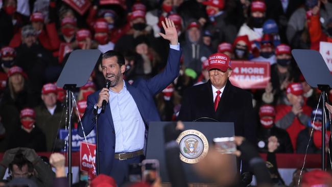 Former president Donald Trump with his son Don Jr. during a campaign rally last year. Picture: AFP