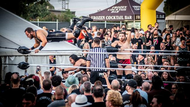 Professional wrestlers performing at Eatons Hill Hotel near Brisbane on Saturday, ahead of the first concert of The Smashing Pumpkins' 10-date Australian tour, titled 'The World is a Vampire'. Picture: Andrew Treadwell