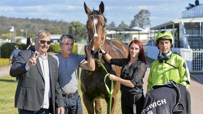 Connections of Animal Instinct, ridden by Jed Hodge, celebrate their win in the Nichols Finance Plate at Ipswich racetrack. Picture: Cordell Richardson