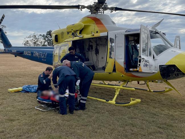 A young pig hunter had to be airlifted to Bundaberg Hospital after he became pinned under his ute on Tuesday, June 25 when he swerved to dodge a pig standing in the middle of the road.