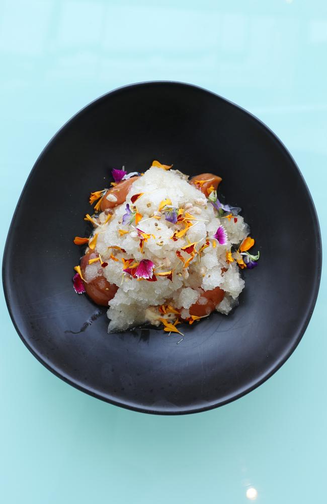 The champagne poached peaches are a delicious summery concoction, teamed with champagne granita, honey and candied nuts.