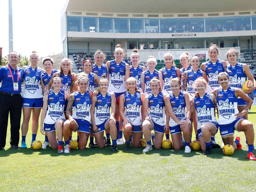 The Kangaroos AFLW team lines up for a team photo before their debut match at North Hobart Oval. Picture: Adam Trafford/AFL Media/Getty Images