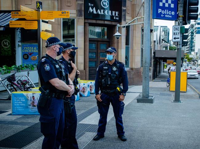 Police officers patrol the Valley Mall in Brisbane during lockdown. Picture; AFP