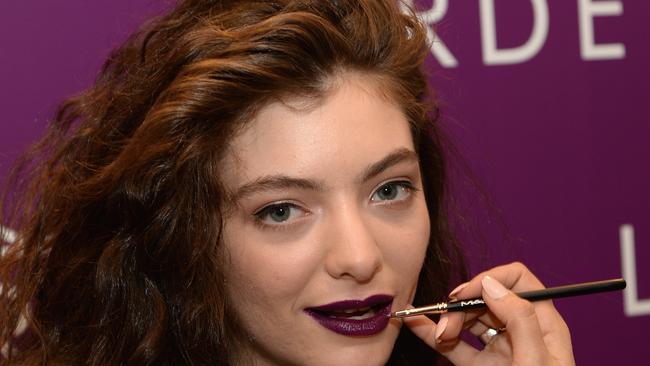 NEW YORK, NY - MAY 20: Musician Lorde poses for a photo as MAC Cosmetics launch their collboration with Lorde at the MAC Pro Showroom on May 20, 2014 in New York City. (Photo by Dimitrios Kambouris/Getty Images for MAC Cosmetics)