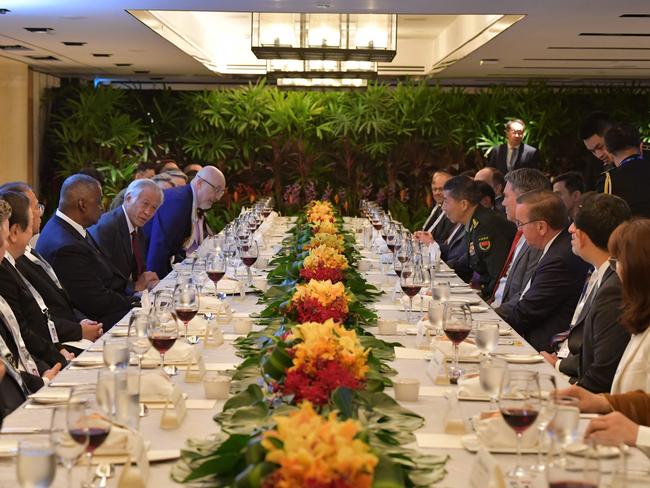 This handout photo taken and released by Singapore's Ministry of Defence on June 3, 2023 shows US Secretary of Defense Lloyd Austin (4th L) with China's Defense Minister Li Shangfu (centre R) and their counterparts attending a ministerial luncheon hosted by Singapore's Defence Minister Ng Eng Hen (5th L) at the 20th Shangri-La Dialogue summit in Singapore. (Photo by Handout / Singapore Ministry of Defence / AFP) / -----EDITORS NOTE --- RESTRICTED TO EDITORIAL USE - MANDATORY CREDIT "AFP PHOTO / SINGAPORE'S MINISTRY OF DEFENCE " - NO MARKETING - NO ADVERTISING CAMPAIGNS - DISTRIBUTED AS A SERVICE TO CLIENTS  -