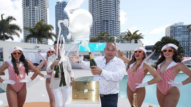 Opening of Cali Beach Club. Official opening by the Artesian Group’s Matt Keegan and Mayor Tom Tate unveiling the plaque then spraying champagne with the Cali Beach Girls. Picture: Glenn Hampson