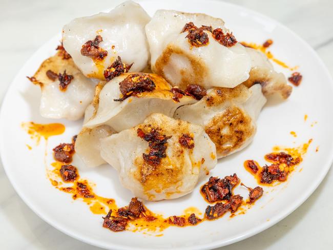 Boiled or pan-fried, the dumplings are always a good idea. Picture: Brendan Beckett