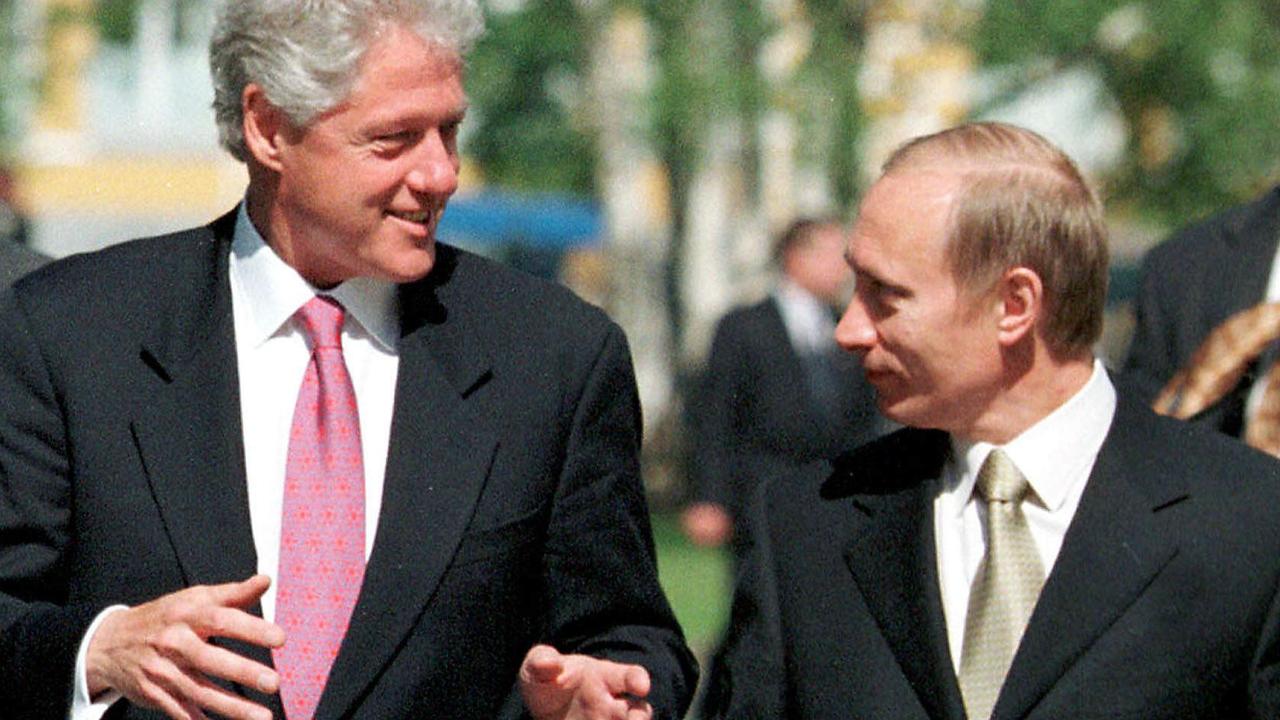 Bill Clinton with Vladimir Putin.