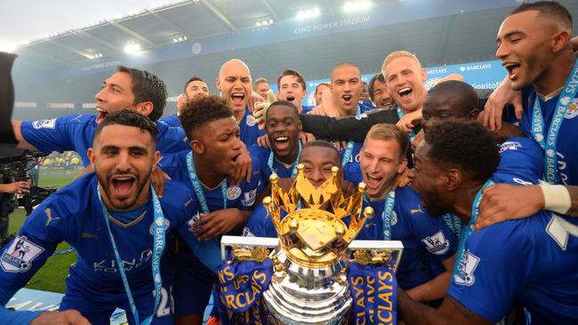 Leicester players with the EPL trophy.