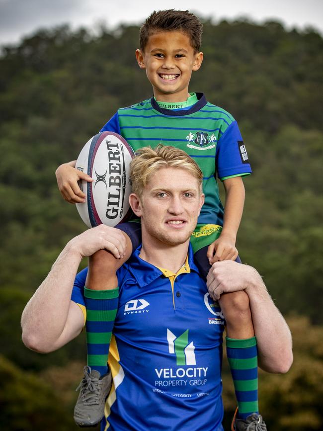 Brisbane City flyhalf Isaac Lucas with GPS junior Thomas Revis. Picture: Brendan Hertel, QRU