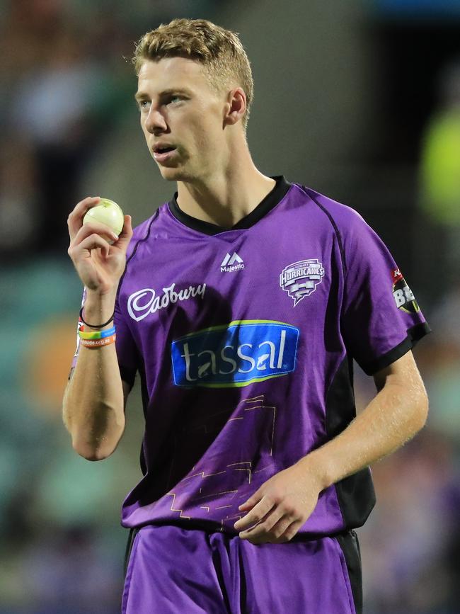 Riley Meredith of the Hurricanes prepares to bowl. Picture: AAP