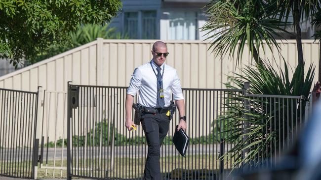 Police investigate a house shooting in Burnewang St Albion. Picture: Tony Gough