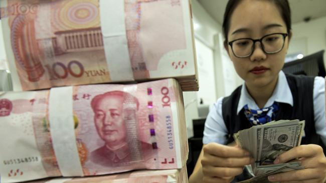 In purely economic terms, a somewhat weaker yuan isn’t that big a deal. Picture: AP