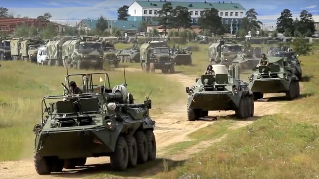 In this screengrab provided by Russian Defence Ministry, the country’s armoured personnel carriers roll during the military exercises in the Chita region, Eastern Siberia, during the Vostok 2018 exercises in Russia.