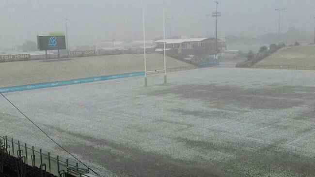 Hail forces Gold Coast footballers off the field in Semi-Final clash. Picture: Paul Mills