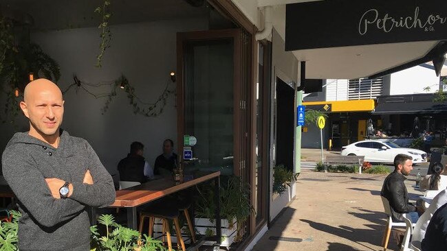 Petrichor &amp; Co cafe co-owner David Ariza only heard of the sudden closure of Racecourse Rd entry off Kingsford Smith Drive from July when a Lendlease representative visited on Monday. Pic: Darren Cartwright