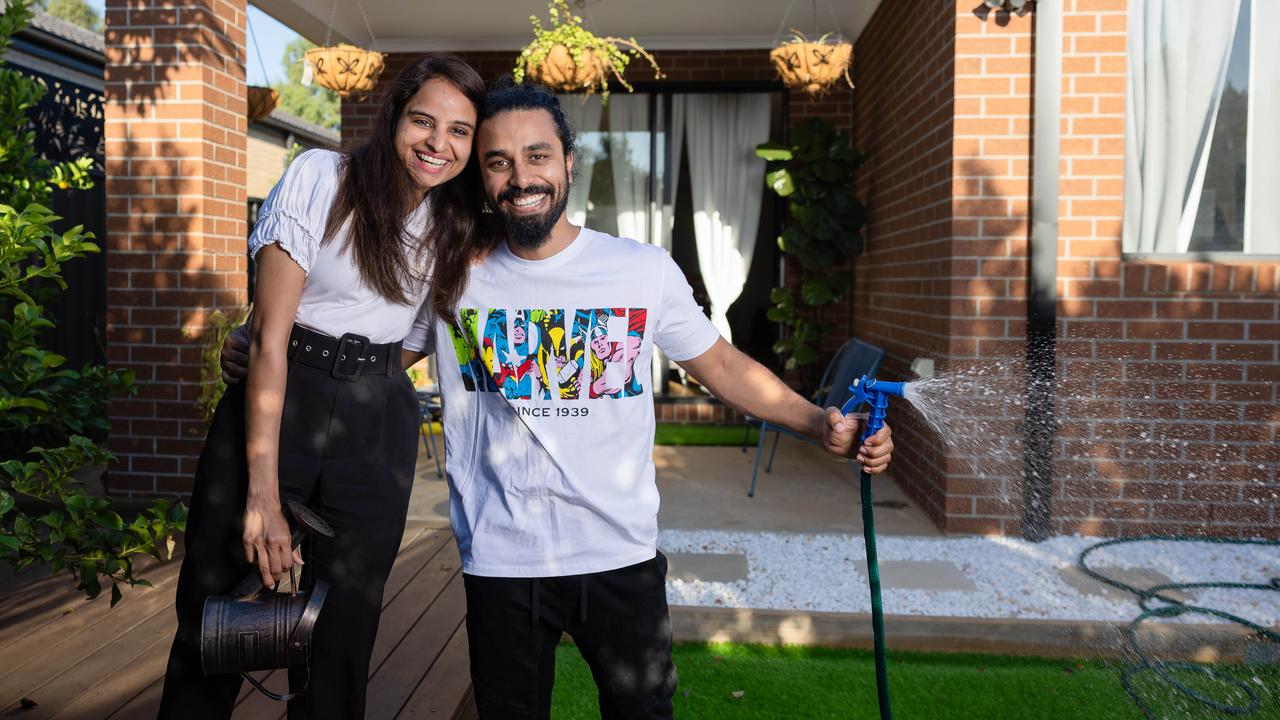 Couple Siri Chandana Gonuri and Sai Abhinav Sita in their garden. When looking to buy, they wanted a decent-sized garden and also a well-ventilated home for all their indoor plants to thrive in. Picture: Jason Edwards.