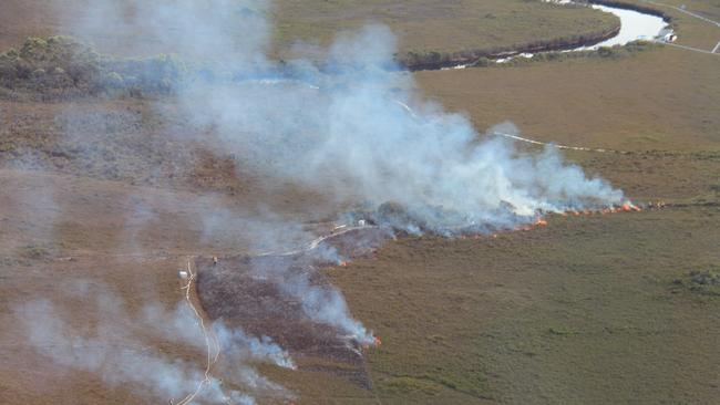 MERCURY TASMANIA, A fuel reduction burn by the Parks and Wildlife Service at Melaleuca. Credit: Parks and Wildlife