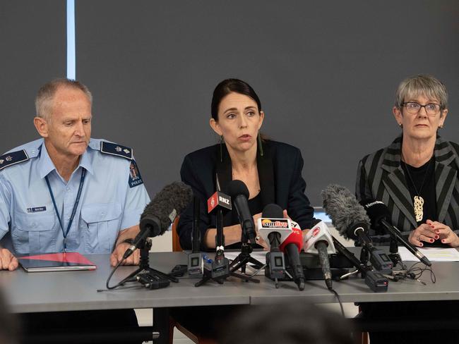 Prime Minister of New Zealand Jacinda Ardern with New Zealand Police Superintendent Bruce Bird and Whakatane Mayor Judy Turner. Picture: AFP