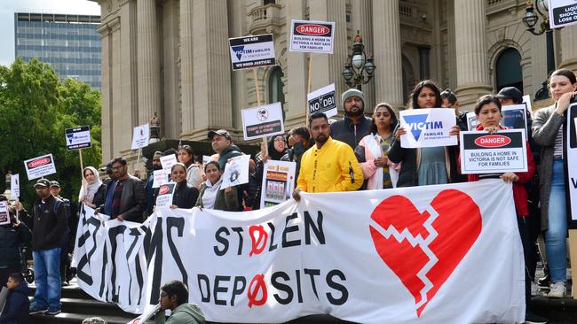 Victims of Porter David collapse protest at the steps of Parliament House, Melbourne. Picture: Nicki Connolly