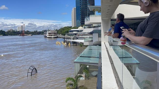 February 2022: Flood waters passing Eagle Street. Picture: Supplied