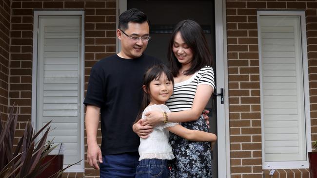 Patrick and Kay Yang, with daughter Cecilia, purchased a house in St Ives because it is teeming with top schools. Picture by Damian Shaw