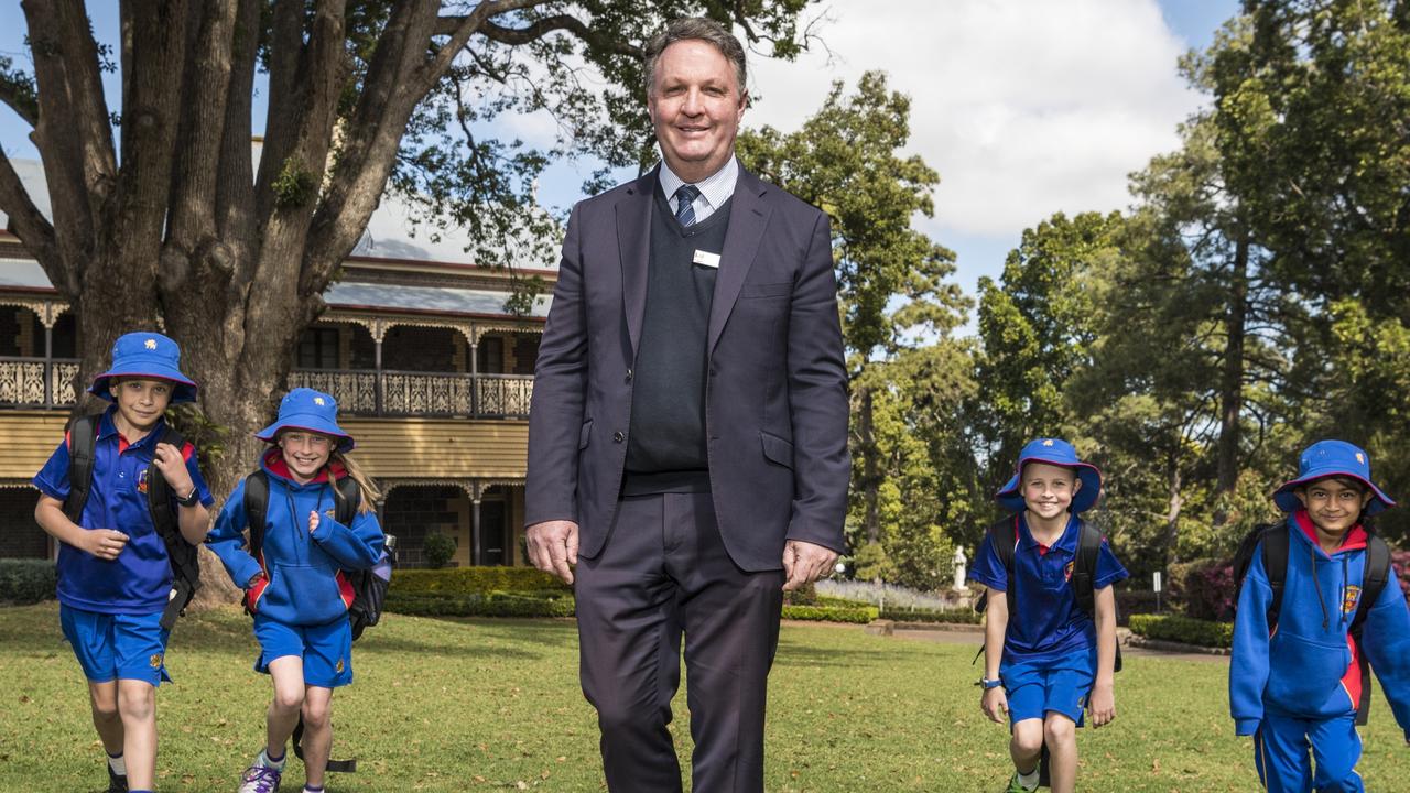 Downlands College principal Stephen Koch with students (from left) Cohen Moore, Sophie Reynolds, Jaxson Parker and Sasithmi Kevitiyagala as the college announces it will take Prep students from 2023. Picture: Kevin Farmer