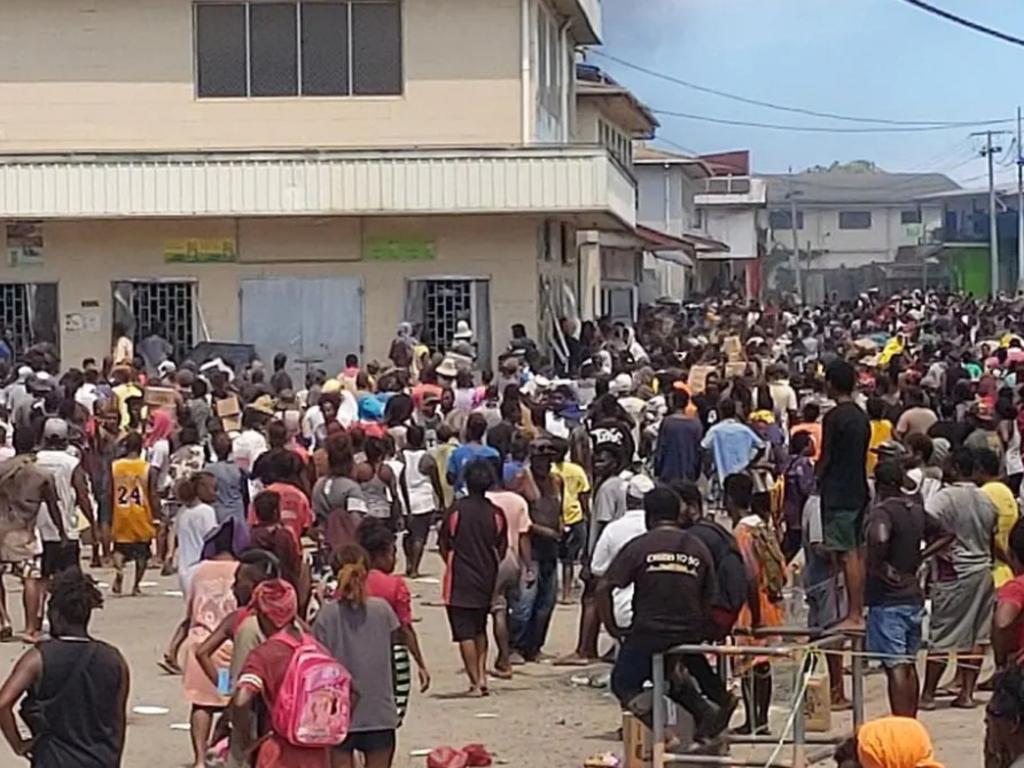 Large crowds are seen in the Solomon Island's capital of Honiara as civil unrest continues for a second day. Picture: Twitter