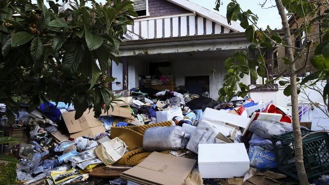 $3 million duplex value trashed: Eviction of hoarders cancelled after ...