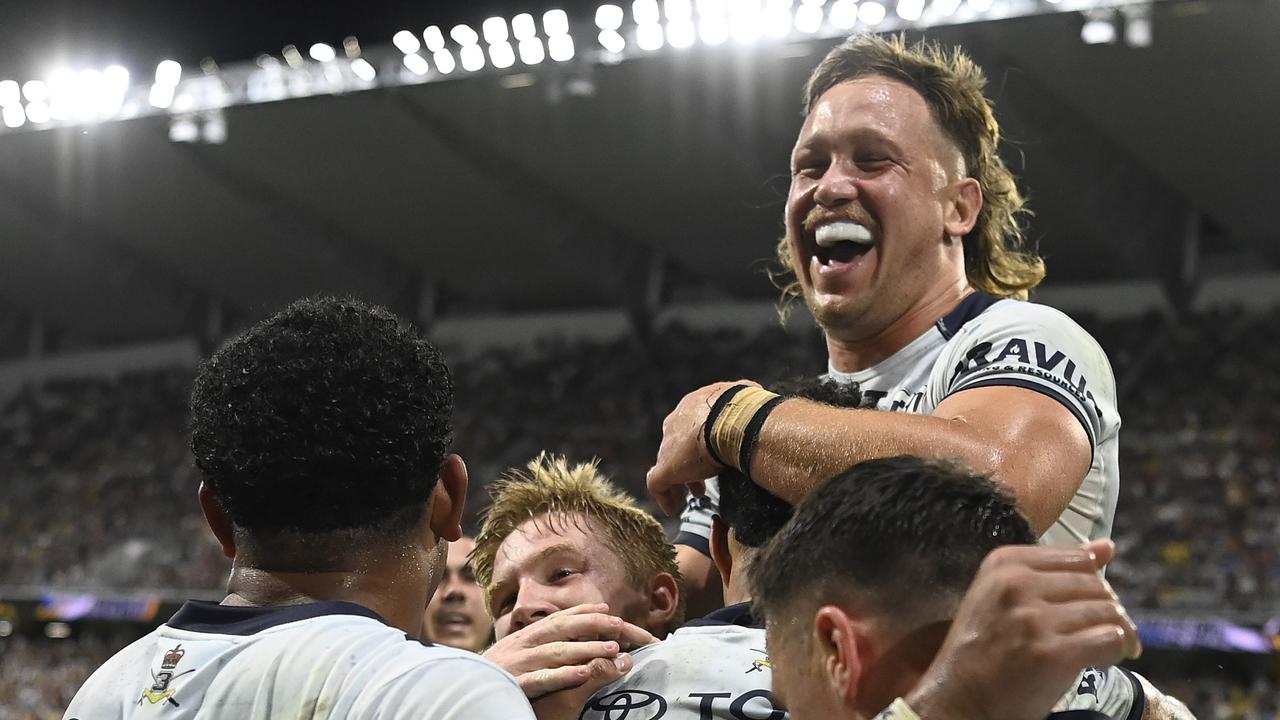 TOWNSVILLE, AUSTRALIA - APRIL 26: Robert Derby of the Cowboys celebrates after scoring a try during the round eight NRL match between North Queensland Cowboys and Gold Coast Titans at Queensland Country Bank Stadium, on April 26, 2025, in Townsville, Australia. (Photo by Ian Hitchcock/Getty Images)