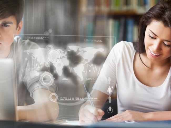Uni students analysing map on digital interface in university library