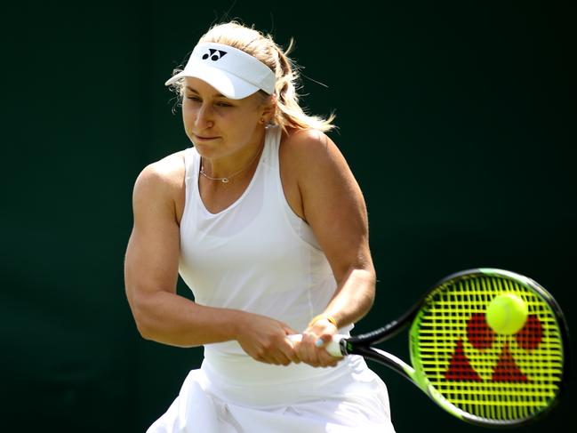 LONDON, ENGLAND - JULY 01: Daria Gavrilova of Australia plays a backhand during the Ladies' Singles first round match against Elina Svitolina of Ukraine during Day one of The Championships - Wimbledon 2019 at All England Lawn Tennis and Croquet Club on July 01, 2019 in London, England. (Photo by Alex Pantling/Getty Images)